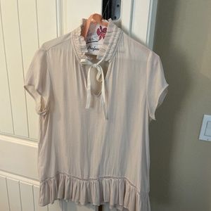 Beige blouse with tie neck